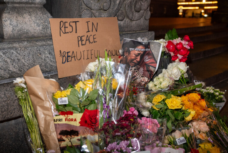 Flowers, placards and photos rest in front of the Copenhagen City Hall on Sept. 9 to pay tribute to Nepali protesters who died in the Nepal “Gen Z” protests.