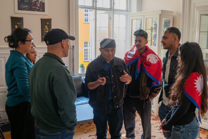 Amid political turmoil in Nepal, Bel (center) and fellow Nepali protesters (right) recall their protest message of “no corruption” to the staff of Nepal Embassy in Copenhagen (left) on Sept. 10, asking the staff to deliver their protest message to the Nepal ambassador in Denmark.