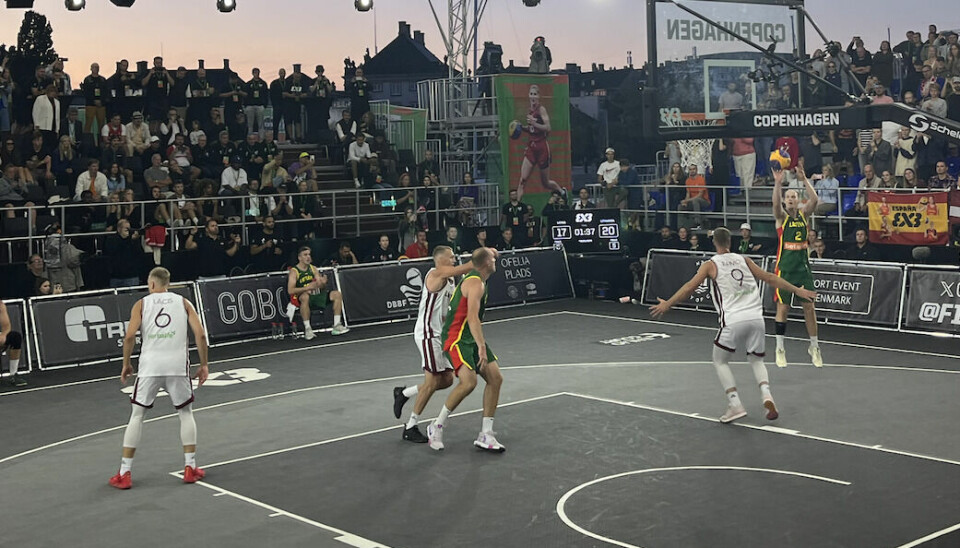 Lithuania's Aurelijus Pukelis scores the cup-winning point in the dying minutes of the final.