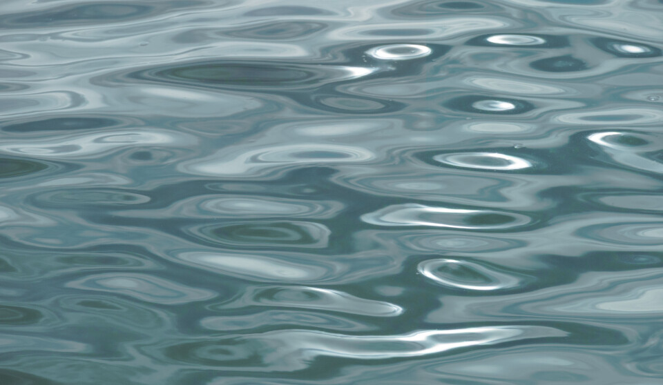 Wavy pattern of the water with sunlight highlighting the texture of the water