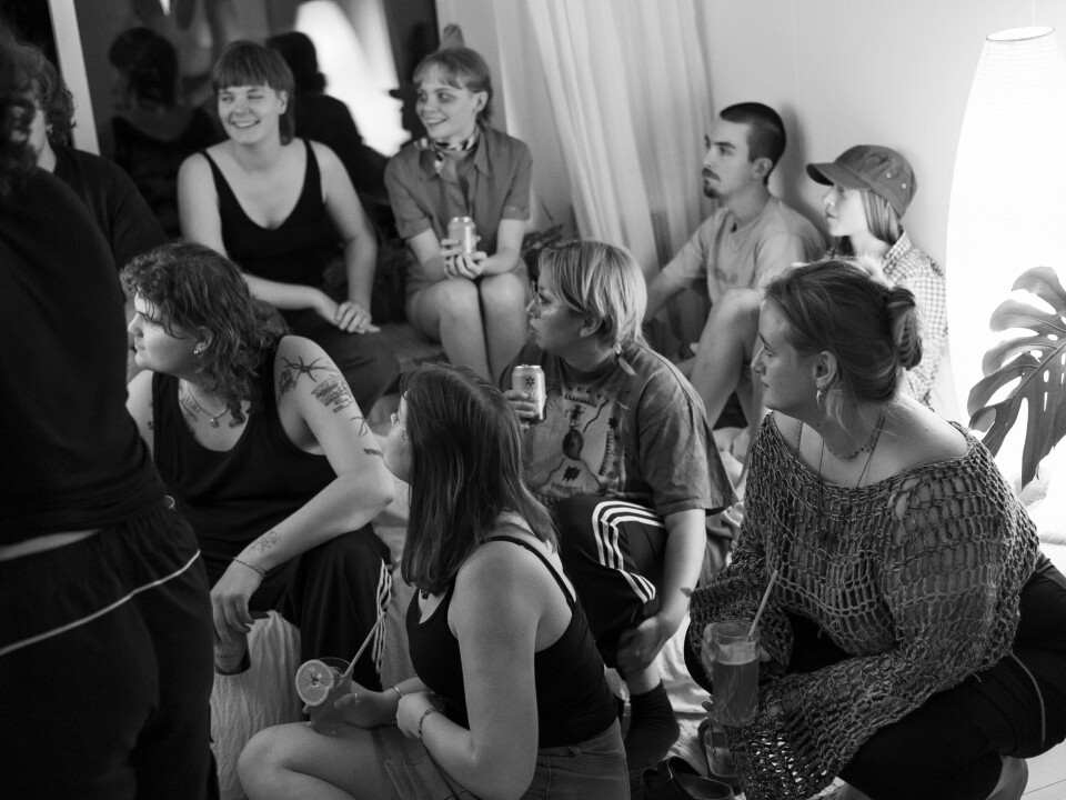 Together Group of people in a room.