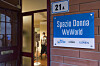 The entrance door to the WeWorld 'Spazio Donna' in Bologna.