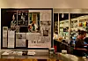 Picture of a bulletin board with advertisements of movies on it. Taken at the Cafe at Grand Teatret.